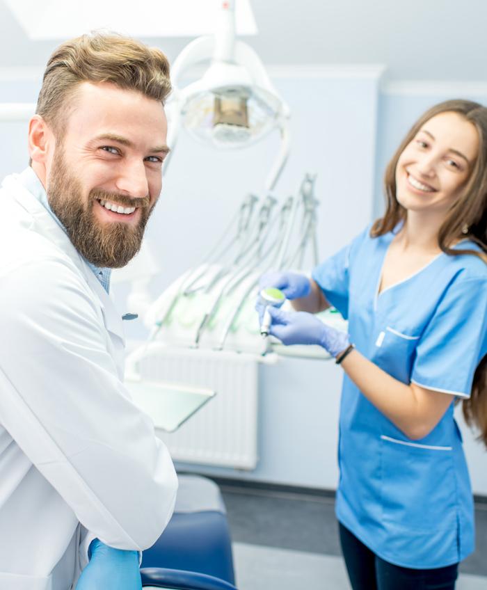 Dental team smiling in office